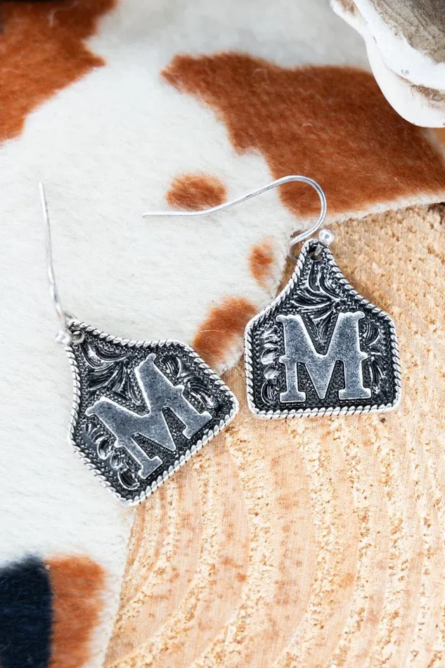 TIPI Cattle Tag ‘M’ Silvertone Earrings